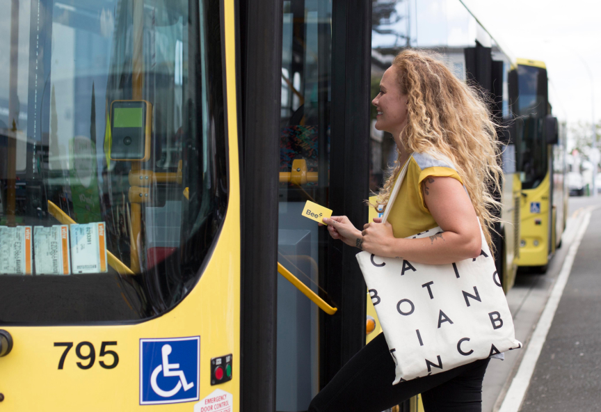 Woman boarding a bus